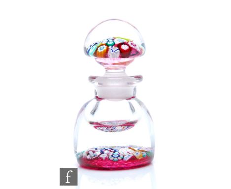 A contemporary John Deacons small glass inkwell, of domed form with short collar neck, internally decorate to the base with a