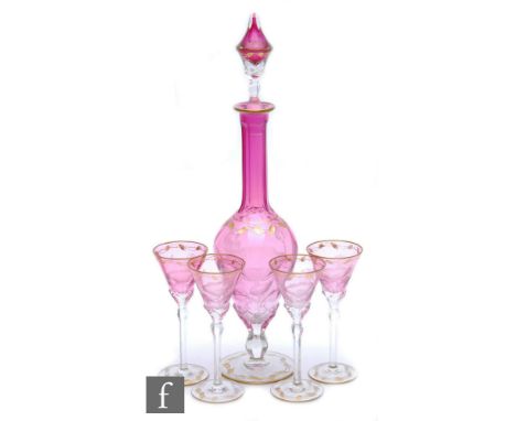 A Moser Paula pattern liqueur set designed by Leo Moser circa 1930, comprising a slender pedestal decanter of ovoid form with