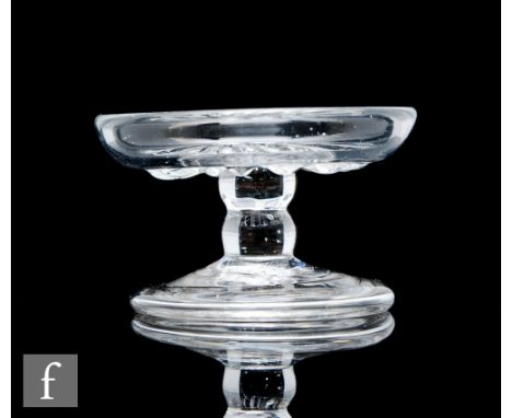 An 18th Century patch stand circa 1750, the shallow dish form top with a central petal moulded detail above a two section bob