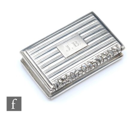 A William IV hallmarked silver rectangular snuff box with reeded decoration, raised foliate thumb piece, weight 62.3g, length