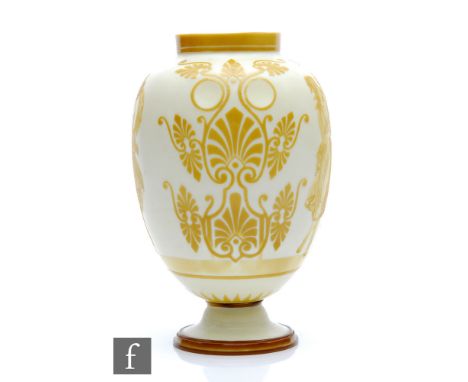 A late 19th Century Stevens &amp; Williams Dolce Relievo vase of footed ovoid form with collar neck cased in a pale buttersco