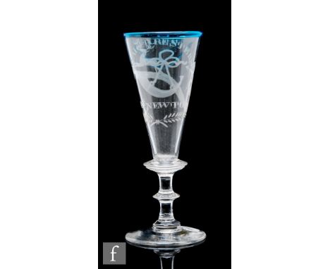 An early 19th Century dwarf ale glass circa 1820, the funnel bowl with green rim and engraved ROYAL FORESTERS over a hunting 