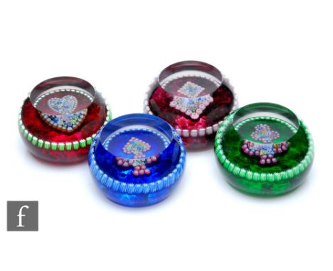 A set of four Perthshire playing card glass paperweights to include Diamond, Club, Spade and Heart, all internally decorated 
