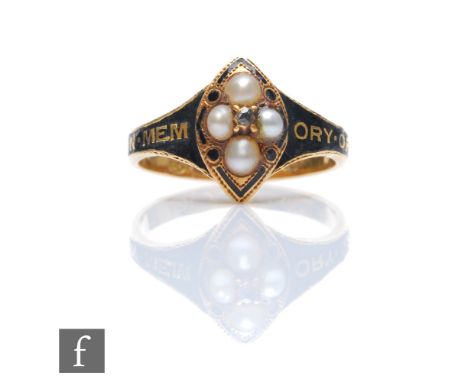 A Victorian memorial ring with central diamond within a four stone pearl surround 'In Memory of' picked out of black enamel, 