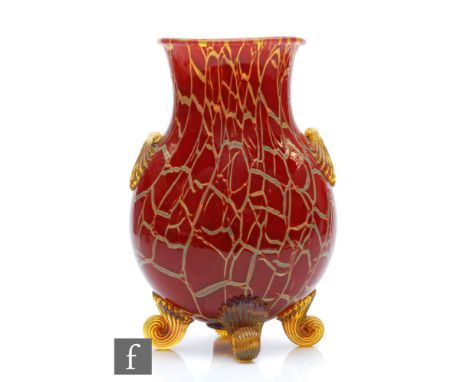 An early 20th Century Bohemian glass vase, of ovoid form with flared neck, the body decorated in ruby crackle design over a t