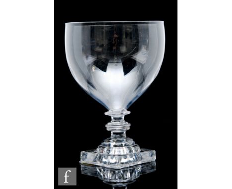 A Georgian large serving rummer, the ovoid bowl above a bladed upper knop and medial triple annulated knop stem, raised to a 