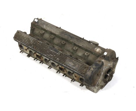 A vintage Jaguar XJ6 car engine cylinder head.