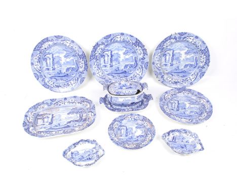 An assortment of blue and white transfer printed ceramics. Including a sauceboat, plates, dishes, etc. by various manufacture
