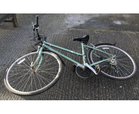 A lady's GT steel framed step-though bicycle. In light green, 'Legacy', height to seat circa 85cm