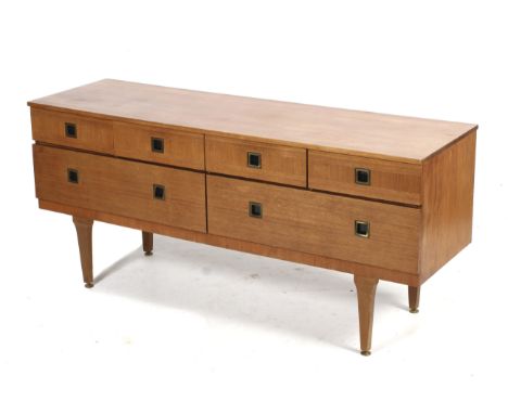 A mid-century Scandinavian sideboard. Consisting of four short drawers over two long, with ceramic and gilt metal sunken hand