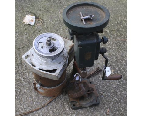 A vintage IXION hand crank pillar drill plus a hand crank sharpening stone wheel.