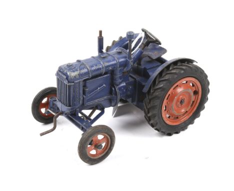 A Chad Valley diecast Fordson Major tractor. Complete with crank, unboxed, H8.5cm