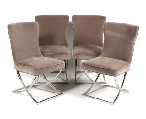 A set of four contemporary velvet upholstered chairs. With chrome metal X shaped base and button back verso. H95cm