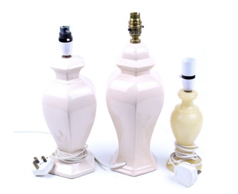 Three contemporary table lamps. Including two pink ceramic examples and a stone example, Max. H31cm