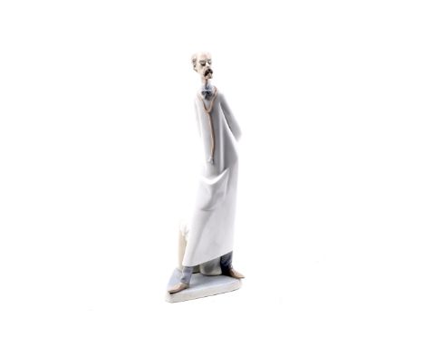 A Lladro porcelain figure of a doctor. Marked 'Medico' #4602, H37cm