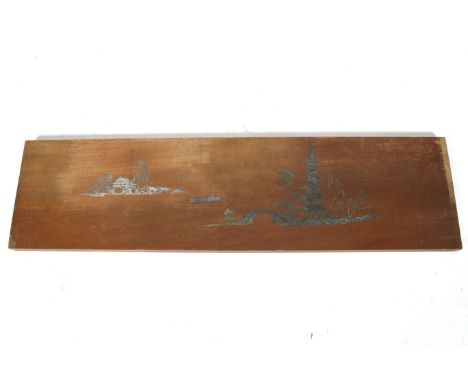 A wooden headboard. Decorated with white metal inlay depicting a Chinese pagoda. 141cm x 37cm