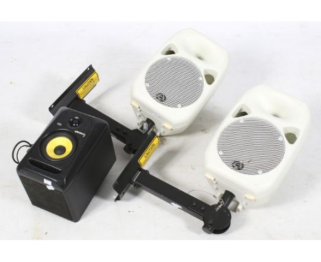 A pair of Wharfdale Pro wall mounted speakers and a KRK System speaker. The KRK speaker marked 'Rokit Powered 5'