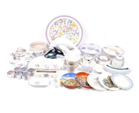 A collection of Poole pottery. Including bowls, salt and pepper shakers, dolphins, etc. Max. H19cmBeing sold on behalf of Age