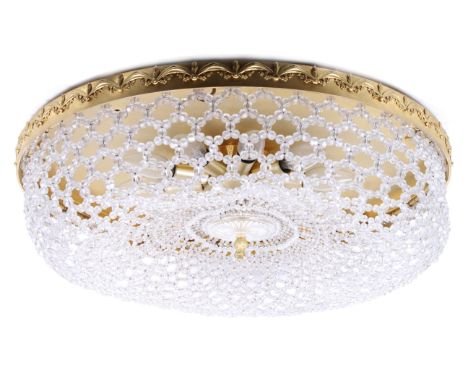 A gilt metal ceiling rose light fitting. With graduated diamonte-style net shade.  Diameter 61cm