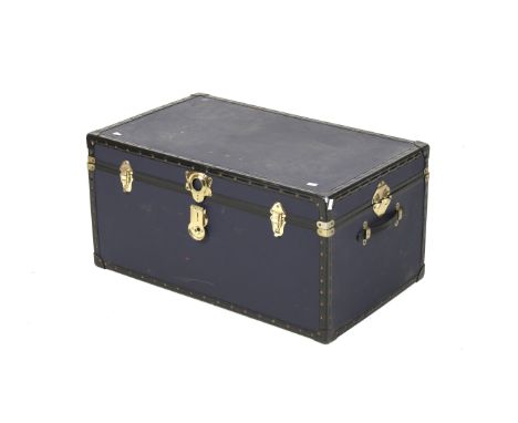 A blue contemporary travel trunk. Of rectangular form with brass catches. L84cm x D51cm x H42cm