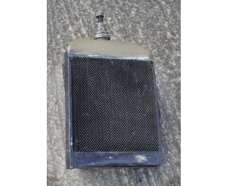 A vintage tractor engine radiator. No visible model number