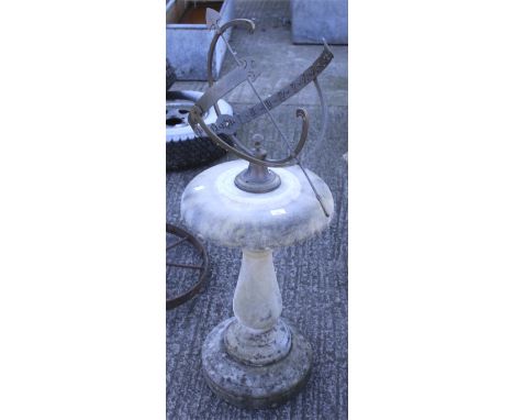 A cast metal sundial. Mounted on a composite stone column, H120cm