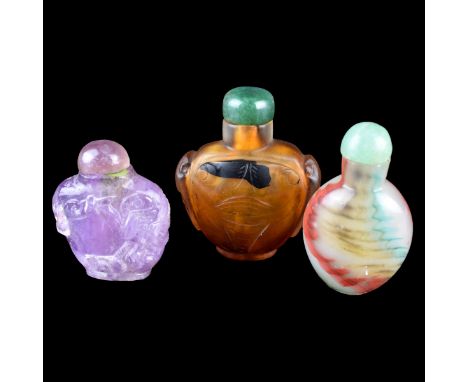 Three (3) Antique Chinese Snuff Bottles. Unmarked. Consists of a Jade, amber color glass, and amethyst snuff bottles. Tallest