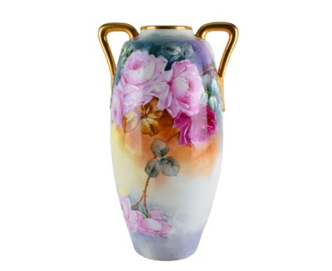 Tall Antique Austrian Gilded Porcelain Handled Vase. Marked on bottom side. Measures 18" H x 10-5/8" W. Condition: Drilled as
