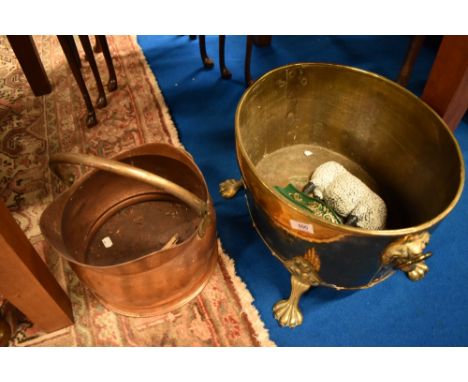 A brass planter , copper coal helmet and cast doorstop modelled as a sheep