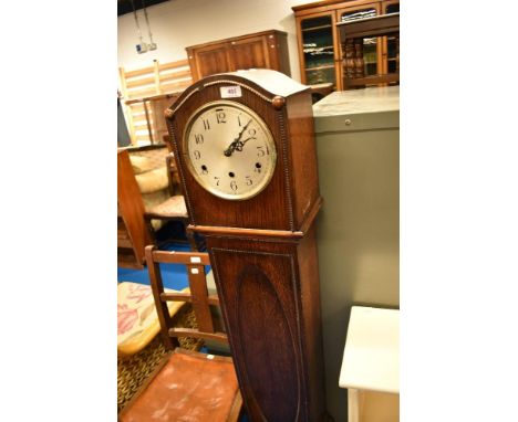An early 20th Century oak grandmother clock (glass door not attached) height approx 142cm