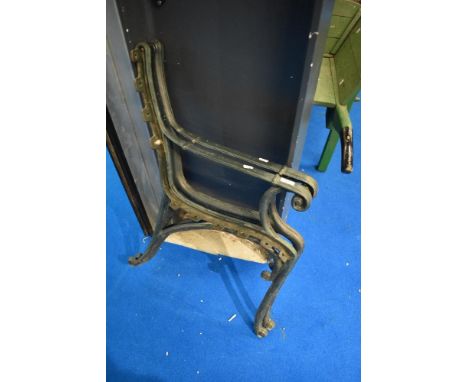 A pair of cast iron bench ends