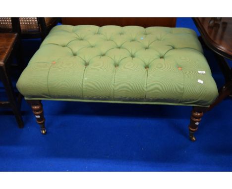 A reproduction Victorian style footstool of large proportions having turned legs and button upholstery, approx 95 x 70cm, hei