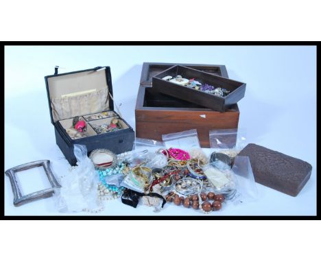 A large collection of vintage costume jewellery to include simulation pearl and beaded necklaces, ladies rings including a ye