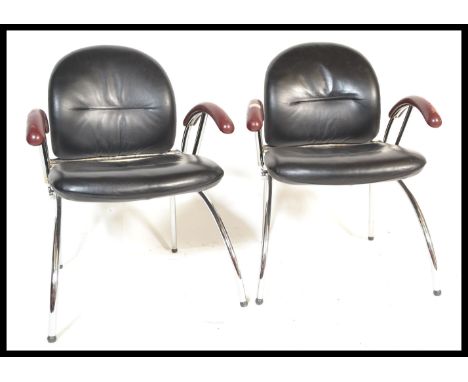 A superb pair of late 20th century retro vintage Bauhaus / Thonet inspired designer armchairs comprising of a heavy steel and