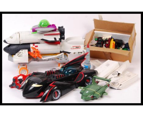 A collection of assorted toys to include; Matchbox space shuttle play set, Mattel made Batman car and a collection of diecast