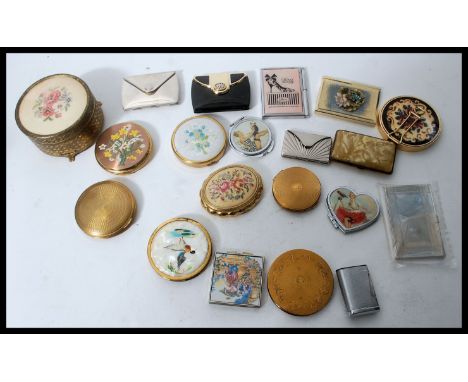 A collection of approx 20 vintage compacts to include Mascot, engine turned, pictorial, pin up girls etc.
