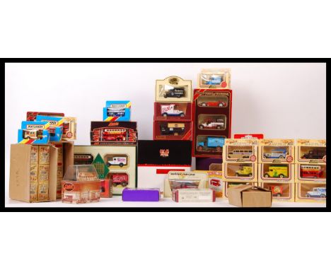 A collection of assorted boxed Matchbox Models Of Yesteryear and Lledo Days Gone diecast scale model vehicles to include; Mat