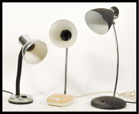 A group of three vintage retro 20th Century industrial table desk anglepoise type lamps to include a beige enamel example wit