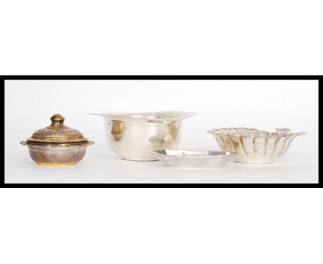 A group of silver to include a 835 silver ten sided trinket / pin dish, stamped silver lidded pot with finial lid, silver sta