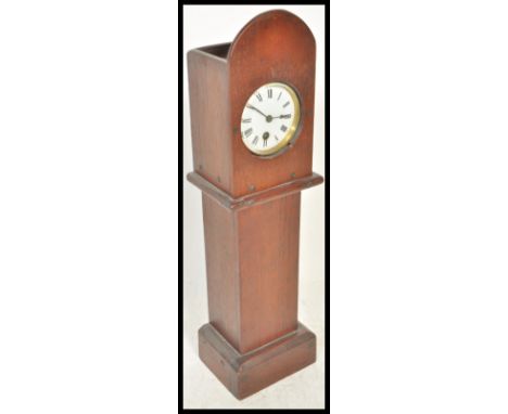 A vintage early 20th Century scratch built oak cased miniature longcase / grandfather clock.&nbsp; The case inset with a bras