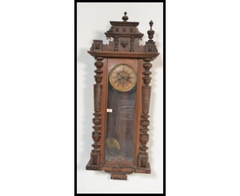 A 19th Century Victorian large Vienna regulator wall clock having a mahogany case with gilt brass sun to dial. Glazed door wi
