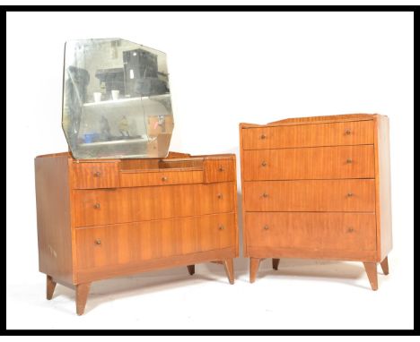 A vintage 20th Century Art Deco walnut veneered bedroom suite consisting of a chest of drawers and matching dressing table ch