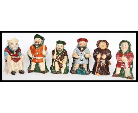 A collection of vintage 20th Century Toby Philpot and character jugs to include a set of Roy Kirkham pottery Robin Hood toby 