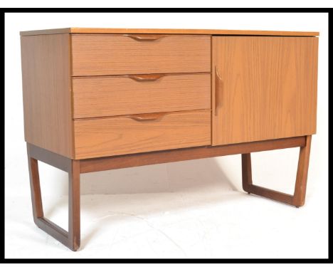A retro vintage 20th century small proportion&nbsp; teak wood veneer having a tree draws to the left and door to the right. M