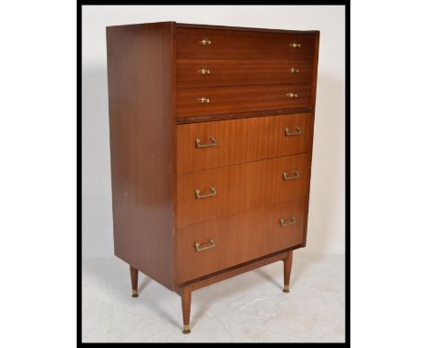 A vintage retro mid 20th Century teak / afromosia chest of six straight graduating drawers by Nathan raised on tapering suppo