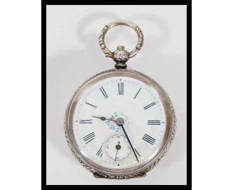 A continental silver 800 pocket fob watch having a white enamel face with Roman numeral chapter ring and faceted hands. Subsi