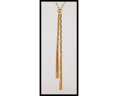 A hallmarked 9ct gold long boxlink necklace chain, having a large bolt ring clasp, with tasseled end. Weighs 13.5 grams.&nbsp