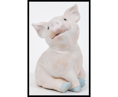 A large vintage 20th Century chalk / ceramic figurine of a pig modelled in a seated position. Tallest measures 33cm height x 