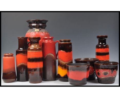 A collection of vintage retro 20th Century West German fat lava style pottery all in a flambe type colourway to include a lar