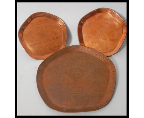 A set of three vintage early 20th Century pub advertising point of sale copper trays for Teachers Highland Cream Old Scotch W